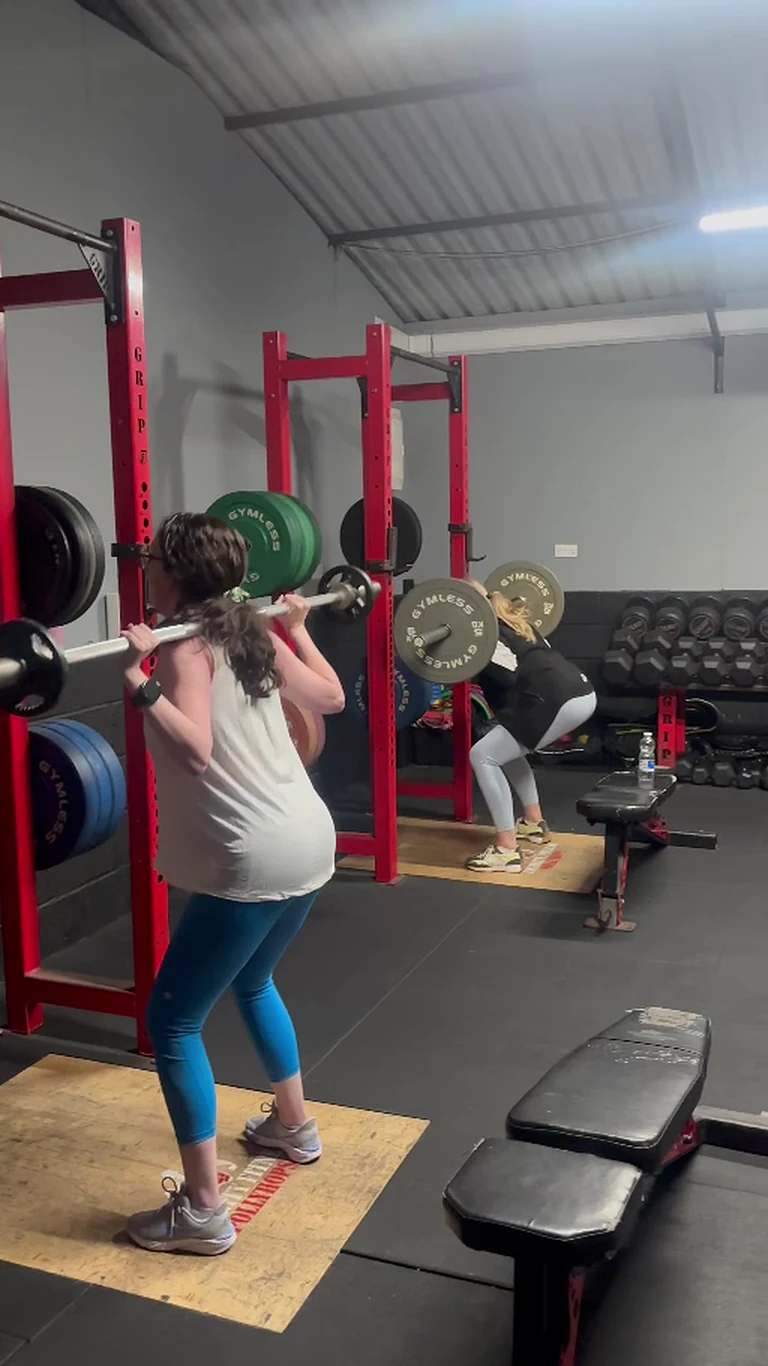 Adult RITUAL members completing coached strength work